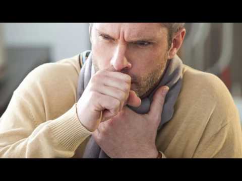 coughing man